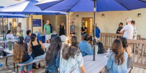 The patio deck of Brogan Hall set the scene for a mini reunion with School of Education and Behavioral Sciences alumni.