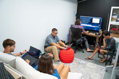 Thirty-two students were divided into three groups then into sub-groups as they pursued their research interests.