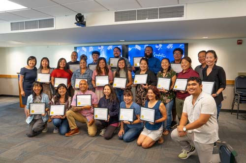 Workshop participants received their certificates after the weeklong series of workshops.