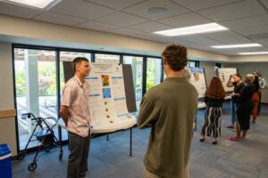 In his final presentation during the Summer Research Institute Symposium, Zach McClellan ’25 decided to pursue the correlation between the effects of occupational stressors on the quality of life among firefighters.