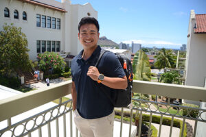 First-year PsyD student Walter Lee admires the Diamond Head and Ocean view the second floor of Ching Hall.