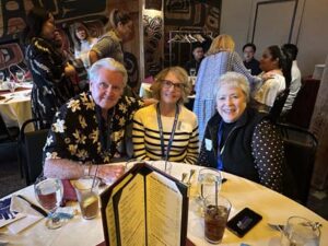 Alumni and guests, including, from left, John "Jack" Culmer '73, Sue Bumgartner and BJ Whitman, '74 '79 MBA, shared stories and memories during the Seattle Reunion.