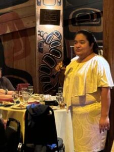 Jacqueline Cano '15 addressed fellow alumni during a gathering at Iver's Salmon House on Lake Union.