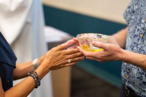 Nursing students and other healthcare providers had their hands anointed during the annual St. Luke's Blessing of the Hands.