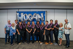 Gary, Christine and Glenn Hogan, from left, congratulate the Hogan Entrepreneurial Leadership graduates, including Jon Watase (center), with Drs. Lynn Babington and Roy Panzarella.