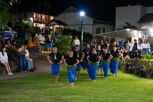 Wearing traditional Marshallese earrings, necklaces and grass skirts, the Micronesian Club entered the Sullivan Family Library Lawn with a lyrical chant.
