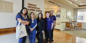 Scholarship Recipient, Jasmine-Kortney Young-Gusman, from left, poses with Registered Nurses, Shawna Chong-Ishii and Erika Tanimoto, Gary Nakata (Hawaii Central FCU Executive Vice President) and Travis Uchino (Hawaii Central FCU Support Services Manager).
