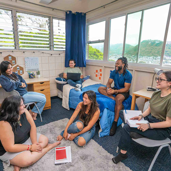 students hanging out in a dorm room