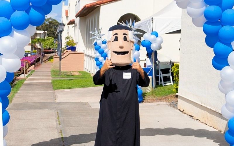 student with Fr. Chami